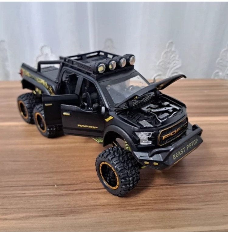 ماکت ماشین فورد رپتور f150 بهمراه موتور مشکی برند چه ژی مقیاس ۱/۲۸ خرید قسطی