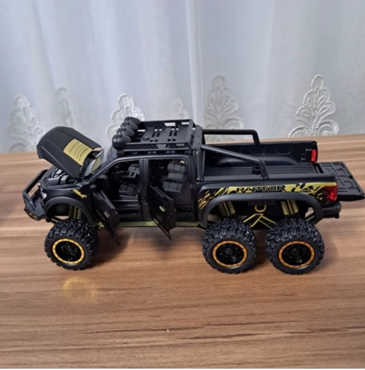 ماکت ماشین فورد رپتور f150 بهمراه موتور مشکی برند چه ژی مقیاس ۱/۲۸ خرید قسطی